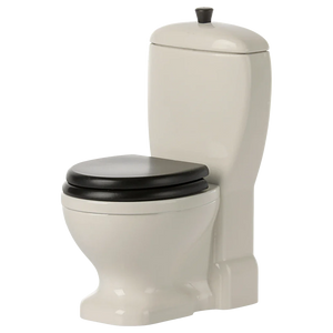 The Maileg Miniature Toilet features an off-white ceramic finish with a black seat and lid, plus a standard tank and flush handle on top—an essential addition to any bathroom assortment.