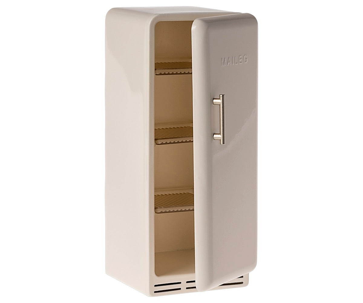 Beige, retro-style Maileg Miniature Fridge with open door, revealing three wire shelves inside—perfect for storing your House of Miniature groceries.