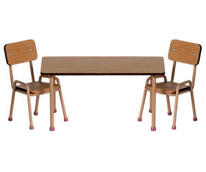 The Maileg Table & Chair Set, Mouse - Dark powder features two beech wood chairs with colorful handmade details and pink-tipped metal legs beside a rectangular wooden table, forming a delightful set.