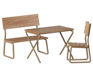 Transform your outdoor space with the Maileg Garden Set, Mouse—featuring a small table, a backrest bench, and a chair with sturdy metal frames and wood slats. Ideal for relaxing or entertaining your mouse family.