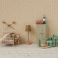 The miniature dollhouse room includes a cozy bed, Maileg's powder-colored mouse alarm clock, a side table with a lamp, and a metal wardrobe. A checkered armchair and small details like wall-mounted knitting needles and a thermos complete the charming space.