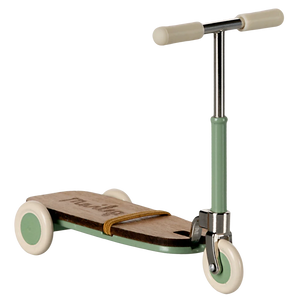 The Maileg Kick Board, Mouse - Mint is a three-wheeled children's scooter with a mint frame, white wheels, cream handles, and charming wooden deck details.