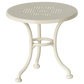 The Maileg Cafe Set, Mouse, Small - Off White is a stylish piece featuring a round metal table with a perforated design and three curved legs. Perfect for adding a unique café vibe to any space while enjoying afternoon sweets.