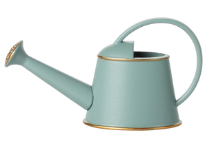 The Maileg Watering Can, Mouse - Light Blue features a long spout, curved handle, and gold trim—perfect for tending to your flowers and plants.
