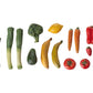 Veggies and Fruits - Miniature by Maileg, featuring assorted plastic miniatures such as leeks, cucumber, broccoli, lemon, bananas, carrots, pepper, strawberries, tomato, and avocado—perfect as organic dollhouse accessories—are beautifully arranged on a white background.