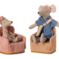 Two plush friends from Maileg sit in rose Folding Chairs, creating a charming farmhouse scene. One mouse wears a pink dress with a headband, and the other is dressed in a blue dress with a headscarf and sash.