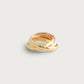 The Anabel Aram Farrier Mixed Metal Triple Band Ring features interlocking gold, silver, and rose gold bands with a hammered texture, creating standout jewelry when displayed on a white background.