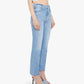A person wears Mother’s The Hustler Ankle Fray high-waist flare jeans with a raw hem, styled with a white sleeveless crop top and light blue heeled sandals, standing against a plain white background.