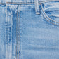 Close-up of The Hustler Ankle Fray jeans by Mother, highlighting the front pocket, belt loop, zipper fly, and metal button on these stylish high-waisted flared jeans with an ankle-length inseam.