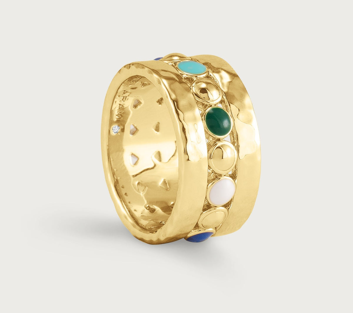 Milos Multicolor Ring featuring a wide 18K gold plated band with a hammered texture and a central row of circular turquoise, green, white, and blue cabochons.