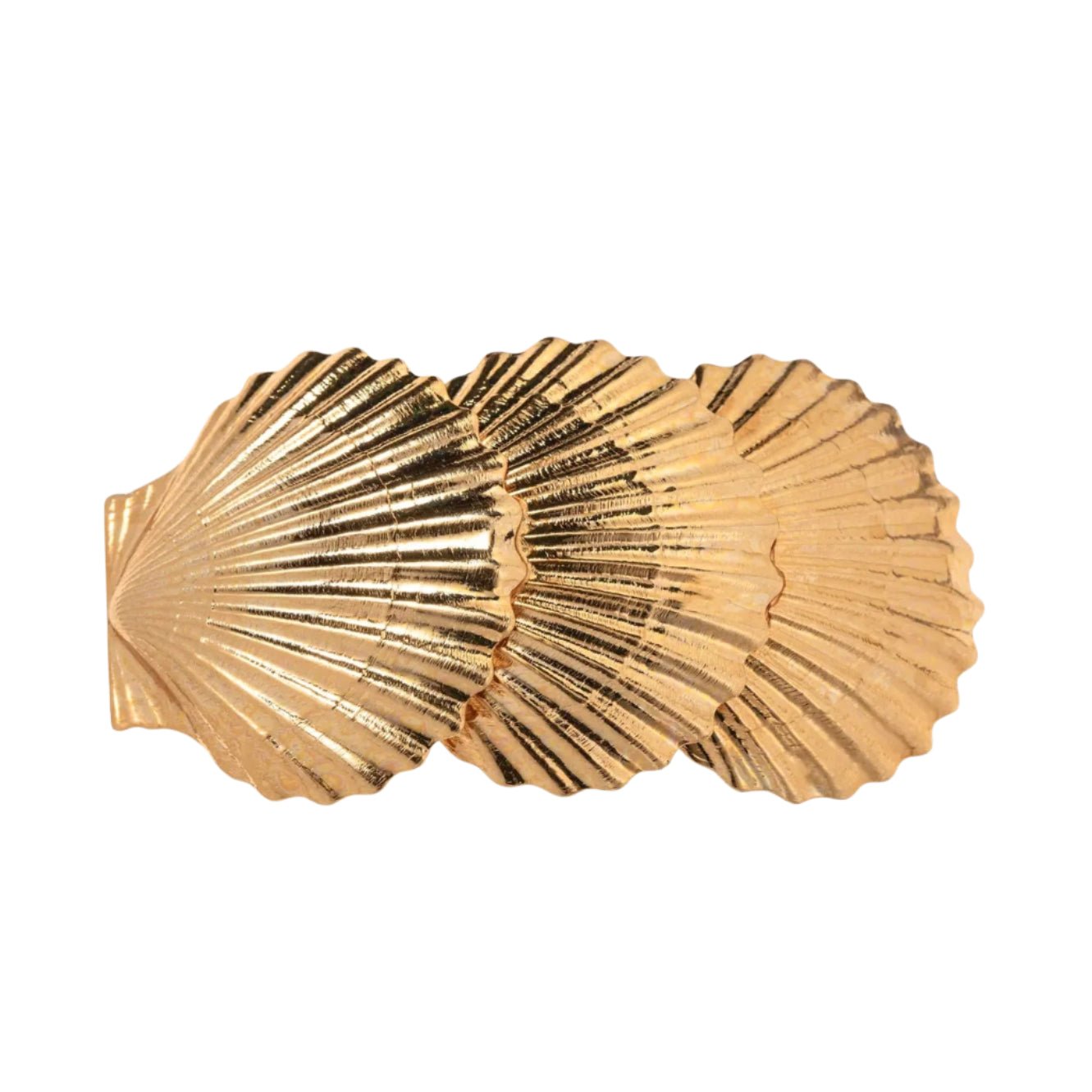 The Jennifer Behr Siren Barrette features three overlapping gold scallop shells and a French barrette clasp, gleaming against a white background.