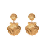 The Caspian Earrings by Jennifer Behr feature a small shell atop a larger scallop, crafted in 18-karat gold-plated metal for an elegant ocean-inspired look.
