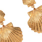 Close-up of two Jennifer Behr Caspian Earrings—shell-shaped with ridged, textured surfaces and a luminous 18-karat gold-plated finish—displayed on a white background.
