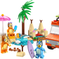 LEGO® Bluey's Beach & Family Car Trip by Legos - Toyhouse is a preschool toy featuring cartoon animal figures, sandcastles, palm trees, picnic accessories, and Bluey's iconic orange car with a green surfboard.