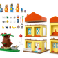 The LEGO® Bluey's Family House by Legos - Toyhouse includes a yellow house with two red roofs, a tree, four character figures, small accessories, and buildable yard elements.