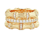 The Anabel Aram Bamboo Stack Ring features an elegant bamboo-inspired design with a central row of pavé crystals, all beautifully dipped in 18k gold.