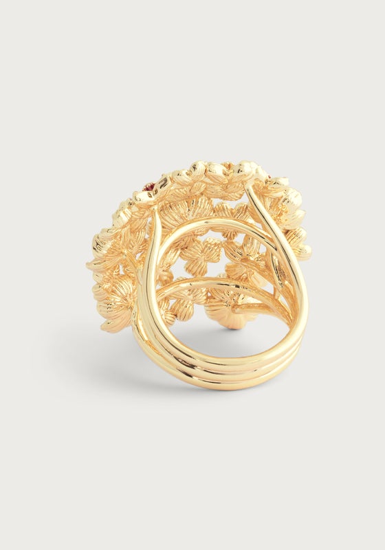 Close-up of the Wildflowers Gathered Ring by Anabel Aram, showing its intricate, multi-petal floral design with textured details crafted in luminous 18k gold-dipped brass.