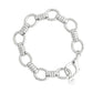 Anabel Aram Neptune Chain Bracelet featuring silver circular links connected by ribbed bar segments, finished with a lobster clasp and a small round charm.