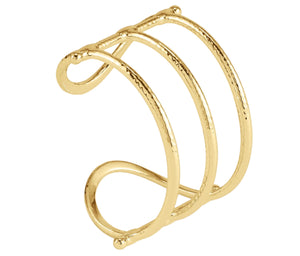 The Cheval Bit Cuff by Anabel Aram features three parallel, textured bands linked at the ends in an open-back design—a refined, equestrian-inspired sculptural bracelet.