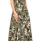 Woman wearing the Cara Cara Asbury Midi Dress, a short-sleeve, button-down, ankle-length dress with a green and white tropical leaf print and self-tie waist, paired with tan sandals.