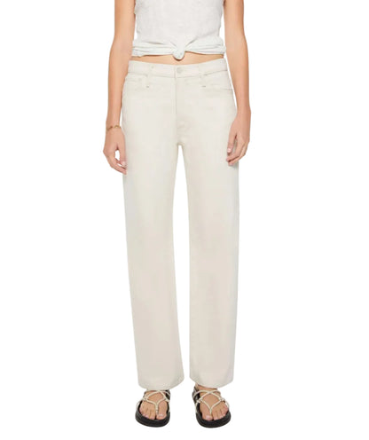 A person wearing off-white Dodger Skimp straight-leg jeans by Mother with a 31-inch inseam, sleeveless knotted top, and strappy sandals stands against a plain background.