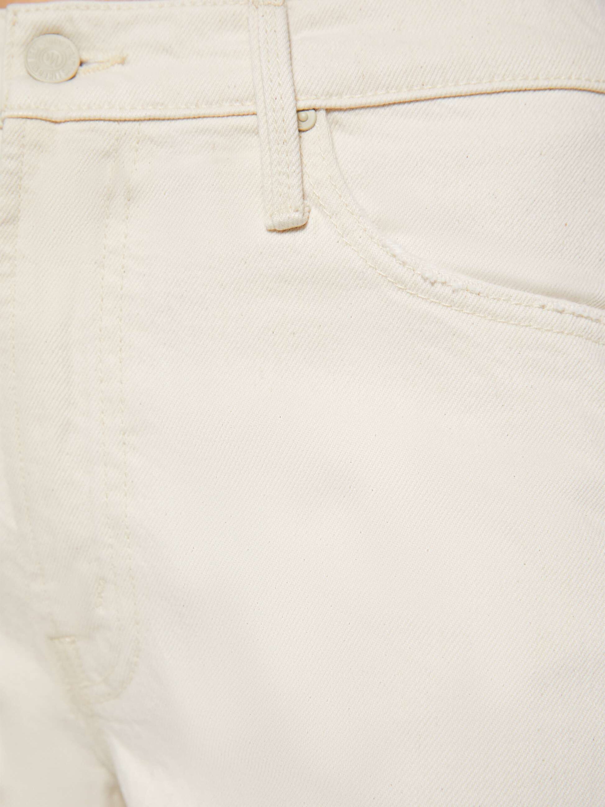 Close-up of the upper section of Mother’s Dodger Skimp white denim jeans, featuring premium cotton, waistband, belt loop, front pocket, and button. These loose straight leg pants offer comfort and style with a classic 31-inch inseam.