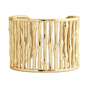 The Bamboo Wide Cuff by Anabel Aram features a bold, gold bamboo-inspired openwork design—an eye-catching sculptural statement bracelet.