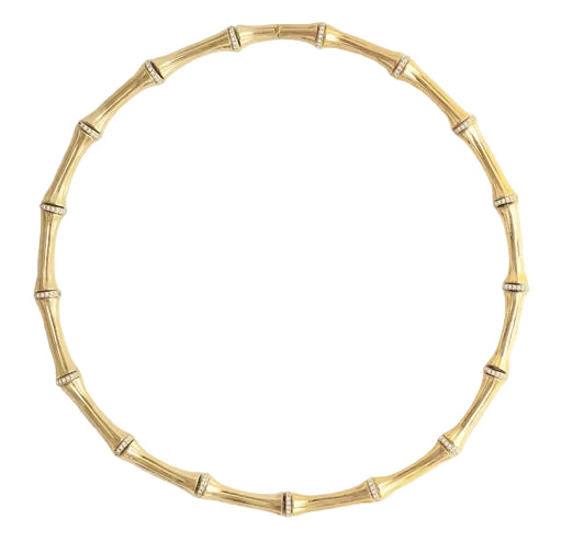 The Anabel Aram Bamboo Necklace features segmented, crystal-studded bamboo-style sections crafted in 18k gold-dipped brass for a modern heirloom look against a white background.
