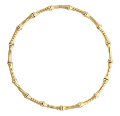 The Anabel Aram Bamboo Necklace features segmented, crystal-studded bamboo-style sections crafted in 18k gold-dipped brass for a modern heirloom look against a white background.