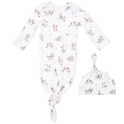 The Angel Dear Baby Boys’ Knotted Gown and Beanie Hat features an ultra soft modal fabric with a charming brown and gray puppy dog print, shown on a plain background.