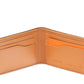 The Slim Fold Wallet by Magnanni features tan calfskin leather, multiple card slots, an interior orange accent, and the brand’s name inside—a refined choice for everyday use.