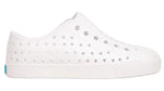 The Kids’ Jefferson Shoes by Native Shoes are lightweight, water-friendly slip-ons featuring multiple ventilation holes and a textured toe and sole, shown here on a plain white background.