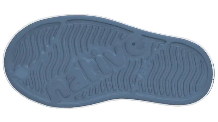 Featuring a blue sole embossed with “native” at the center and wavy traction patterns with textured edges for added grip, the Kids’ Jefferson Shoes by Native Shoes are lightweight, water-friendly, and eco-friendly—crafted to deliver comfort and durability for active young feet.