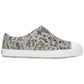 A side profile view of the Kids’ Jefferson Print Shoes by Native Shoes is displayed against a white background. This gray camouflage slip-on sneaker, crafted with Sugarlite™ technology, features a shock-absorbent white sole and toe cap, offering lightweight comfort and a modern design.