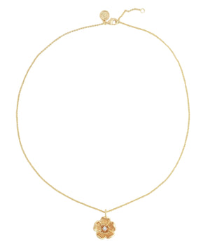 The Anabel Aram Wildflowers Pendant Necklace features a single flower-shaped centerpiece on a delicate chain, dipped in 18k gold and displayed against a white background.