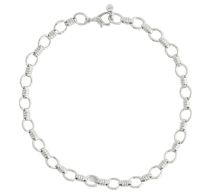 Anabel Aram Neptune Chain necklace in silver, featuring repeating circular links with banded accents and a lobster claw clasp.