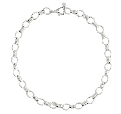 Anabel Aram Neptune Chain necklace in silver, featuring repeating circular links with banded accents and a lobster claw clasp.