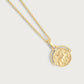 The Anabel Aram Pegasus Gold Coin Charm is a gold necklace with a textured Pegasus coin featuring an embossed profile and decorative accents, shown on a plain light background.