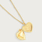 The Anabel Aram Heart Locket Necklace, crafted from gold-dipped brass with a beaded-edge detail, is an elegant keepsake shown on a simple light background.