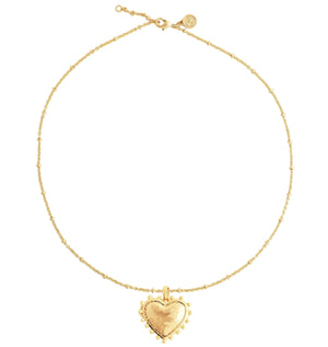 The Anabel Aram Heart Locket Necklace features an 18k gold heart-shaped pendant on a delicate chain, making it a perfect keepsake piece.