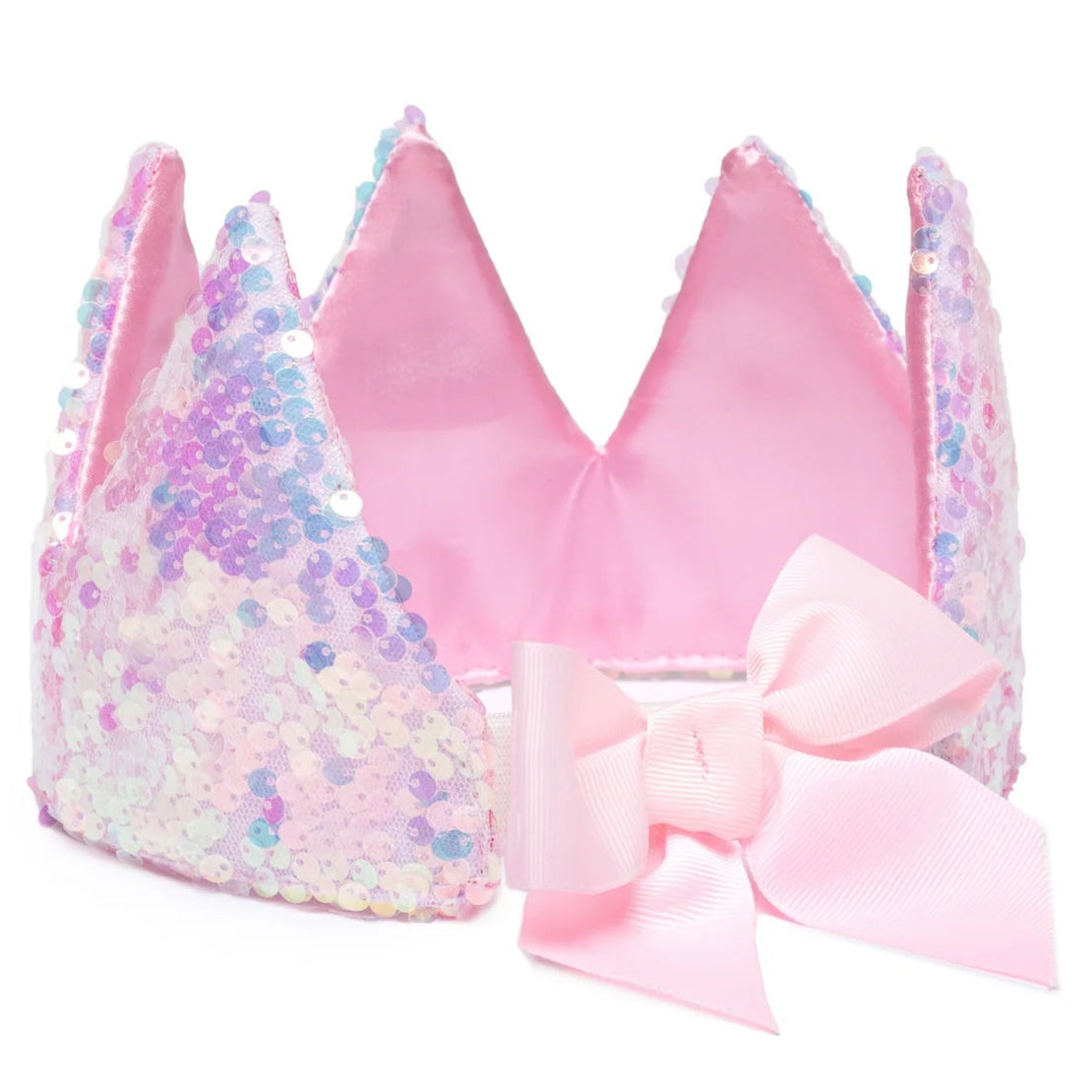 The Great Pretenders Ombre Sequins Crown is a pink satin crown decorated with ombre sequins and features a large pink bow on the front.