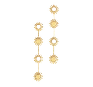 Milos Soleil Drop Earrings: a pair of 18K gold plated drop earrings featuring a vertical chain of four sun-shaped motifs with rays.