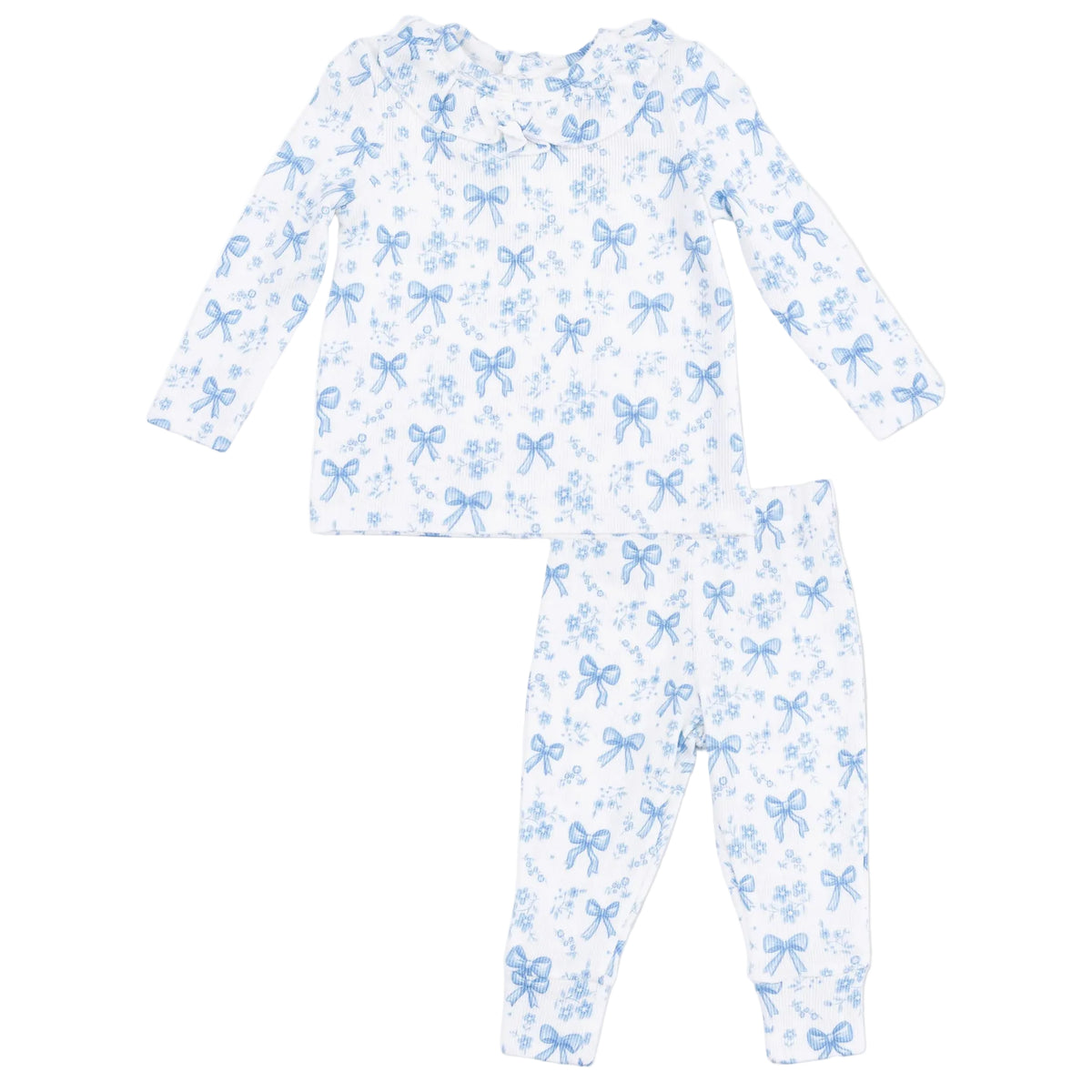 The Angel Dear Baby Girls’ Long Sleeve Ruffle Top and Pant set features a cozy white ribbed modal fabric, with both the ruffle top and matching pants adorned in a charming blue bow and floral pattern for extra comfort and style.
