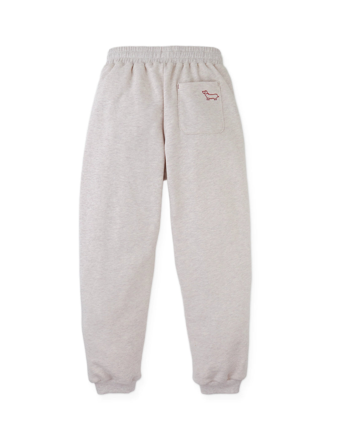 The Boys’ Alessio French Terry Jogger Pants by Gingersnaps are shown from the back in light gray, featuring an elastic waistband, cuffed ankles, and a small embroidered back pocket on the right with a red animal outline.
