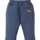 The Gingersnaps Baby Boys’ Sonny Pant features a navy blue fleece design with an elastic waistband, a small front pocket, and an embroidered yellow dog on the left side—an everyday essential for playful comfort.