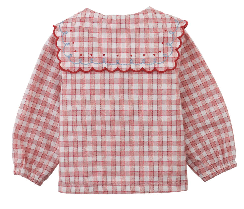 The Baby Girls’ Gracia Checkered Blouse by Gingersnaps features long sleeves, a red and white storybook check pattern, a scalloped sailor collar with red trim, and blue embroidered accents on the collar.
