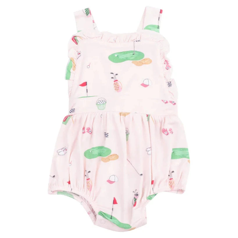 The Angel Dear Baby Girls' Bamboo Golf Things Pink Ruffle Bubble is a pale pink romper with ruffles and shoulder straps, crafted from soft bamboo viscose and adorned with a golf-themed print of clubs, balls, tees, flags, and greens.