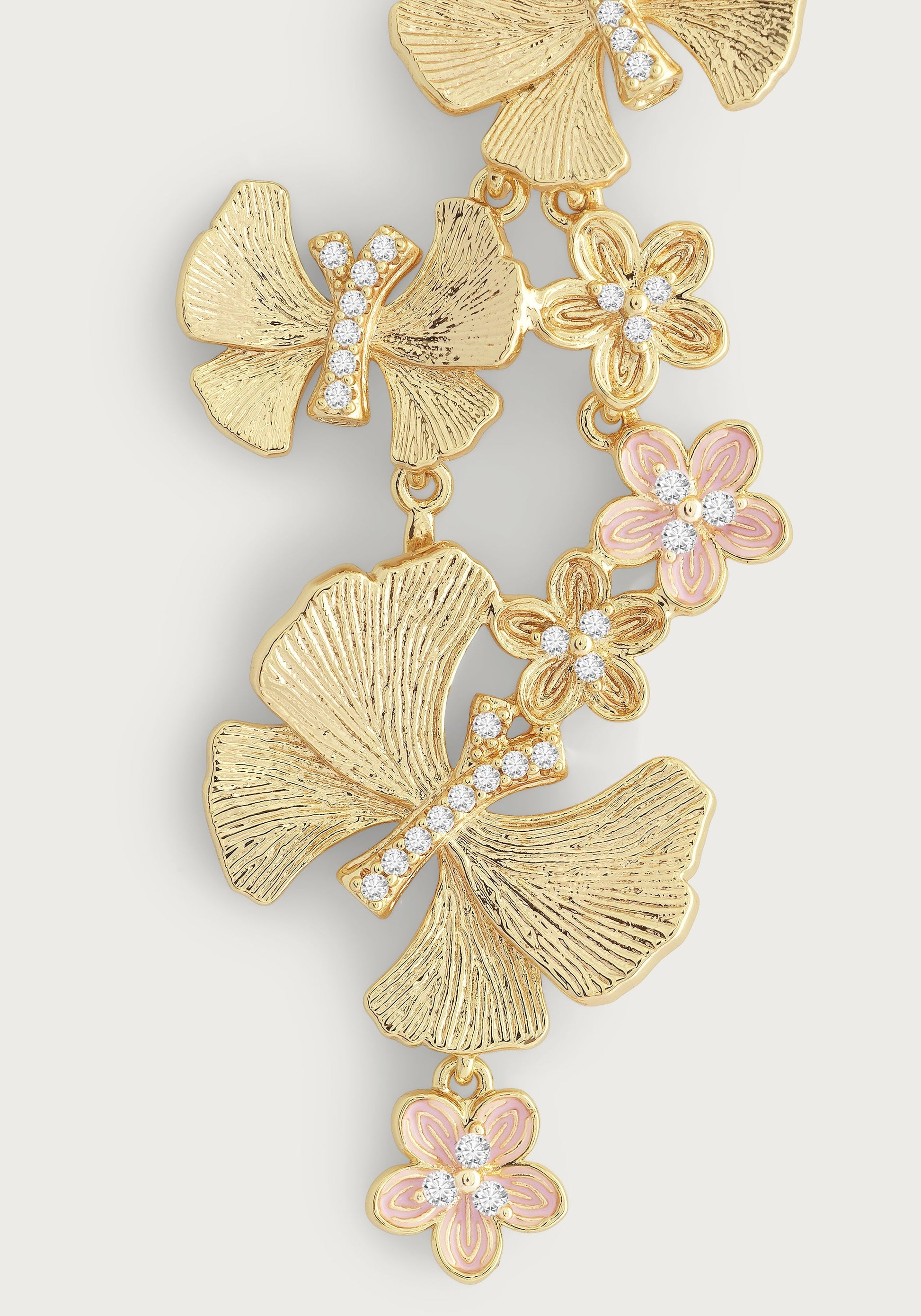 Anabel Aram’s Butterfly with Flowers Dangle Earrings feature a cascading gold-tone design with textured flowers, pink accents, and rhinestones.