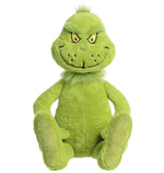 The Aurora Dr. Seuss Grinch, Jumbo is a bright green plush with embroidered yellow eyes and a mischievous smile, designed to sit upright.