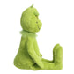 A side view of an Aurora Dr. Seuss Grinch, Jumbo plush toy is shown sitting upright with legs extended and arms at its sides, set against a white background.